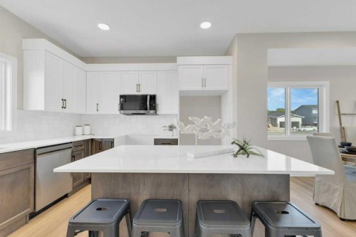 13 Gray Close, Sylvan Lake, AB - Indoor Photo Showing Kitchen With Upgraded Kitchen