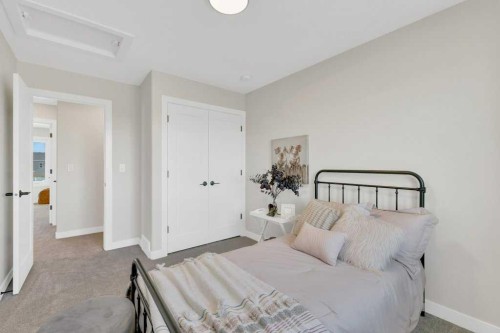 13 Gray Close, Sylvan Lake, AB - Indoor Photo Showing Bedroom