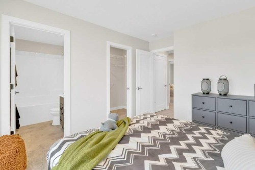 13 Gray Close, Sylvan Lake, AB - Indoor Photo Showing Bedroom