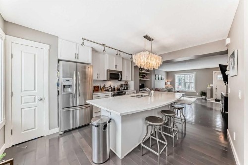 105 Mckenzie Towne Square Se, Calgary, AB - Indoor Photo Showing Kitchen With Stainless Steel Kitchen With Double Sink With Upgraded Kitchen