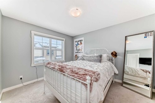 105 Mckenzie Towne Square Se, Calgary, AB - Indoor Photo Showing Bedroom