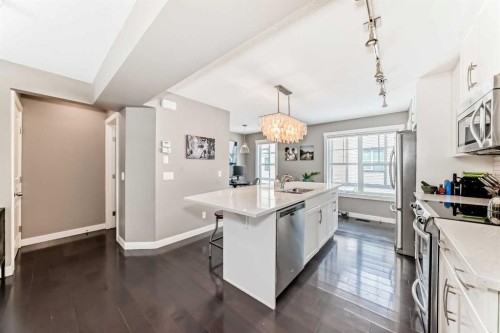 105 Mckenzie Towne Square Se, Calgary, AB - Indoor Photo Showing Kitchen With Stainless Steel Kitchen With Upgraded Kitchen