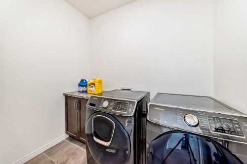 73 Carrington Circle Nw, Calgary, AB - Indoor Photo Showing Laundry Room