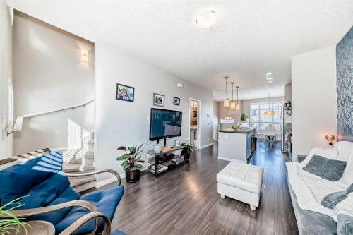 656 Copperpond Boulevard Se, Calgary, AB - Indoor Photo Showing Living Room