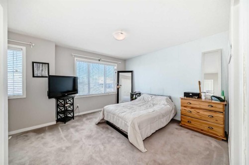 656 Copperpond Boulevard Se, Calgary, AB - Indoor Photo Showing Bedroom