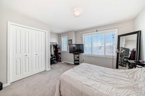 656 Copperpond Boulevard Se, Calgary, AB - Indoor Photo Showing Bedroom