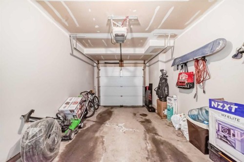 656 Copperpond Boulevard Se, Calgary, AB - Indoor Photo Showing Garage