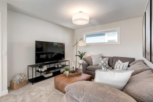 128 Quartz Crescent, Cochrane, AB - Indoor Photo Showing Living Room