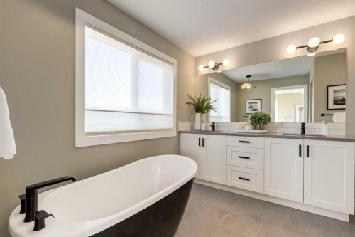 128 Quartz Crescent, Cochrane, AB - Indoor Photo Showing Bathroom