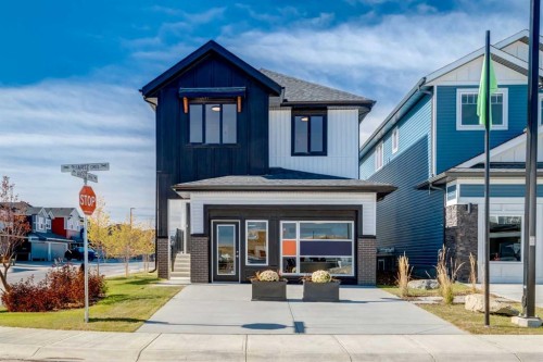 128 Quartz Crescent, Cochrane, AB - Outdoor With Facade