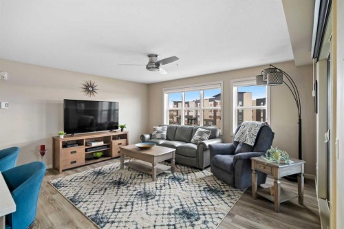 2310-10 Market Boulevard Se, Airdrie, AB - Indoor Photo Showing Living Room
