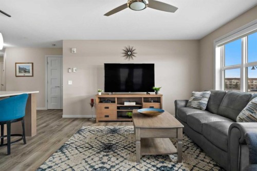 2310-10 Market Boulevard Se, Airdrie, AB - Indoor Photo Showing Living Room