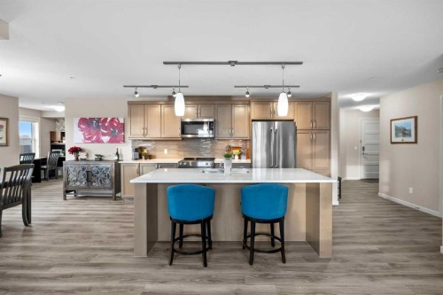 2310-10 Market Boulevard Se, Airdrie, AB - Indoor Photo Showing Kitchen With Stainless Steel Kitchen With Upgraded Kitchen