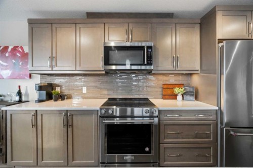 2310-10 Market Boulevard Se, Airdrie, AB - Indoor Photo Showing Kitchen With Stainless Steel Kitchen
