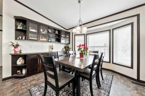 4 Spring Dale Circle Se, Airdrie, AB - Indoor Photo Showing Dining Room
