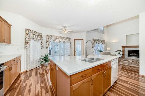 120 Cove Road, Chestermere, AB - Indoor Photo Showing Kitchen With Double Sink