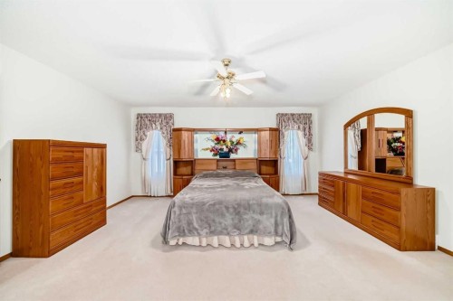 120 Cove Road, Chestermere, AB - Indoor Photo Showing Bedroom