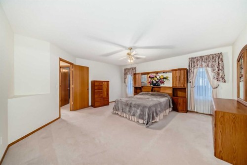 120 Cove Road, Chestermere, AB - Indoor Photo Showing Bedroom
