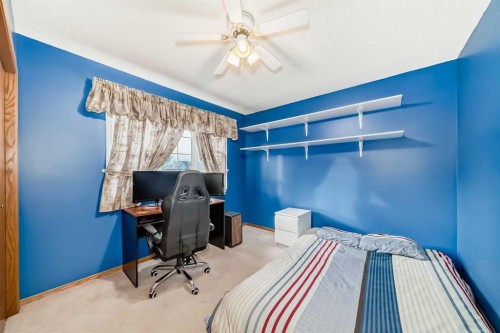 120 Cove Road, Chestermere, AB - Indoor Photo Showing Bedroom