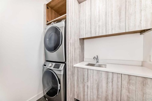 923 36A Street Nw, Calgary, AB - Indoor Photo Showing Laundry Room