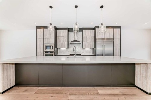923 36A Street Nw, Calgary, AB - Indoor Photo Showing Kitchen With Upgraded Kitchen