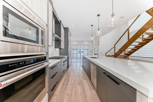923 36A Street Nw, Calgary, AB - Indoor Photo Showing Kitchen With Upgraded Kitchen