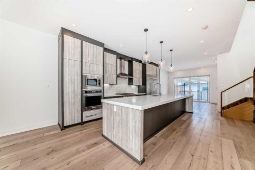 923 36A Street Nw, Calgary, AB - Indoor Photo Showing Kitchen With Upgraded Kitchen