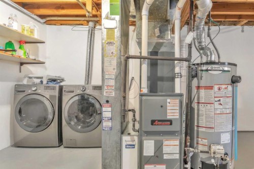 218 Pinemeadow Road Ne, Calgary, AB - Indoor Photo Showing Laundry Room