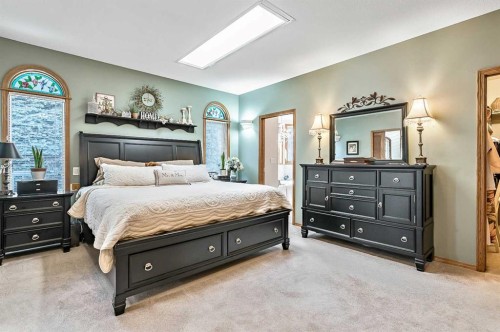 607 9 Street Se, High River, AB - Indoor Photo Showing Bedroom