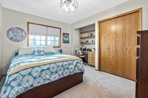 607 9 Street Se, High River, AB - Indoor Photo Showing Bedroom