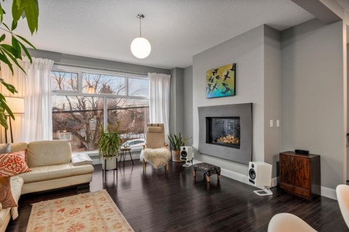 2915 17 Street Sw, Calgary, AB - Indoor Photo Showing Living Room With Fireplace