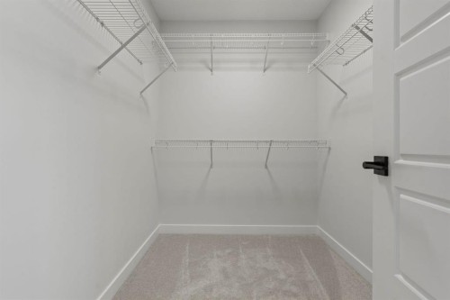 2220 Lancaster Heights Se, Airdrie, AB - Indoor With Storage