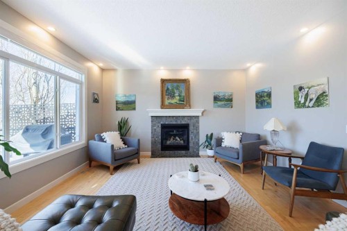 98 Tuscany Estates Crescent Nw, Calgary, AB - Indoor Photo Showing Living Room With Fireplace