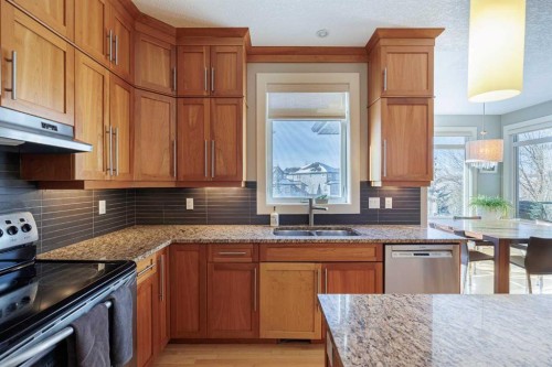 98 Tuscany Estates Crescent Nw, Calgary, AB - Indoor Photo Showing Kitchen With Stainless Steel Kitchen With Double Sink With Upgraded Kitchen