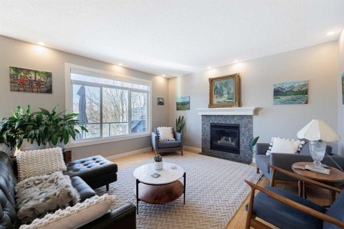 98 Tuscany Estates Crescent Nw, Calgary, AB - Indoor Photo Showing Living Room With Fireplace