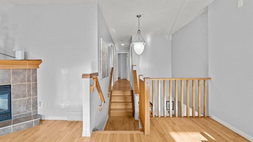 158 Covemeadow Road Ne, Calgary, AB - Indoor Photo Showing Other Room With Fireplace