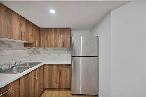 67 Copperstone Circle Se, Calgary, AB - Indoor Photo Showing Kitchen With Double Sink
