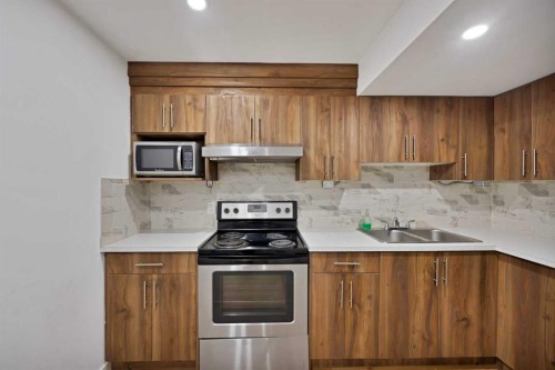 67 Copperstone Circle Se, Calgary, AB - Indoor Photo Showing Kitchen With Stainless Steel Kitchen With Double Sink