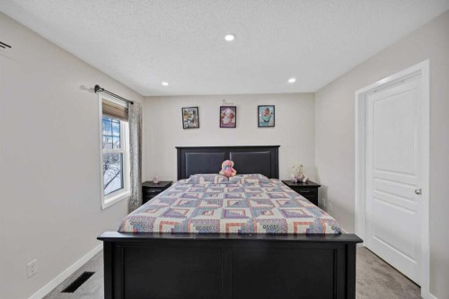 67 Copperstone Circle Se, Calgary, AB - Indoor Photo Showing Bedroom