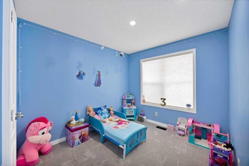 67 Copperstone Circle Se, Calgary, AB - Indoor Photo Showing Bedroom