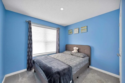 67 Copperstone Circle Se, Calgary, AB - Indoor Photo Showing Bedroom