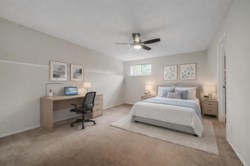 222 Diamond Court Se, Calgary, AB - Indoor Photo Showing Bedroom