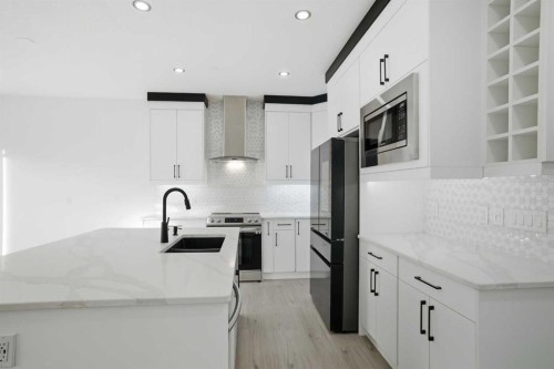 3610 Cornerstone Boulevard Ne, Calgary, AB - Indoor Photo Showing Kitchen With Stainless Steel Kitchen With Double Sink With Upgraded Kitchen