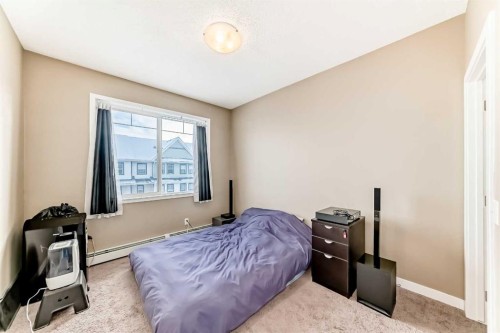 312-48 Panatella Road Nw, Calgary, AB - Indoor Photo Showing Bedroom