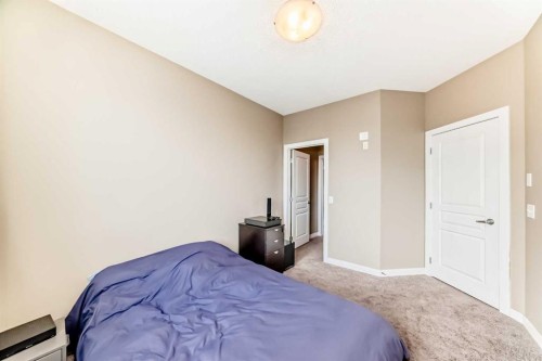 312-48 Panatella Road Nw, Calgary, AB - Indoor Photo Showing Bedroom