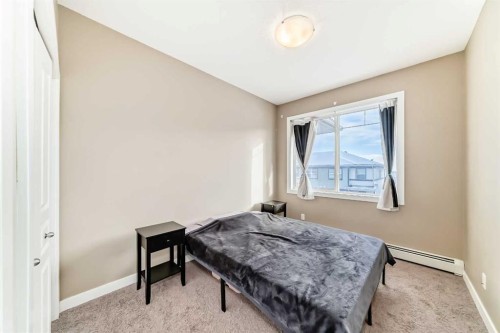 312-48 Panatella Road Nw, Calgary, AB - Indoor Photo Showing Bedroom