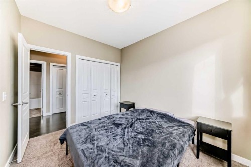 312-48 Panatella Road Nw, Calgary, AB - Indoor Photo Showing Bedroom
