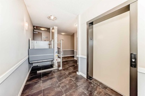 312-48 Panatella Road Nw, Calgary, AB - Indoor Photo Showing Laundry Room