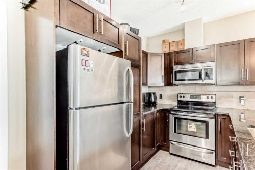 312-48 Panatella Road Nw, Calgary, AB - Indoor Photo Showing Kitchen