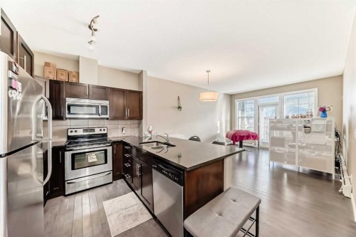 312-48 Panatella Road Nw, Calgary, AB - Indoor Photo Showing Kitchen